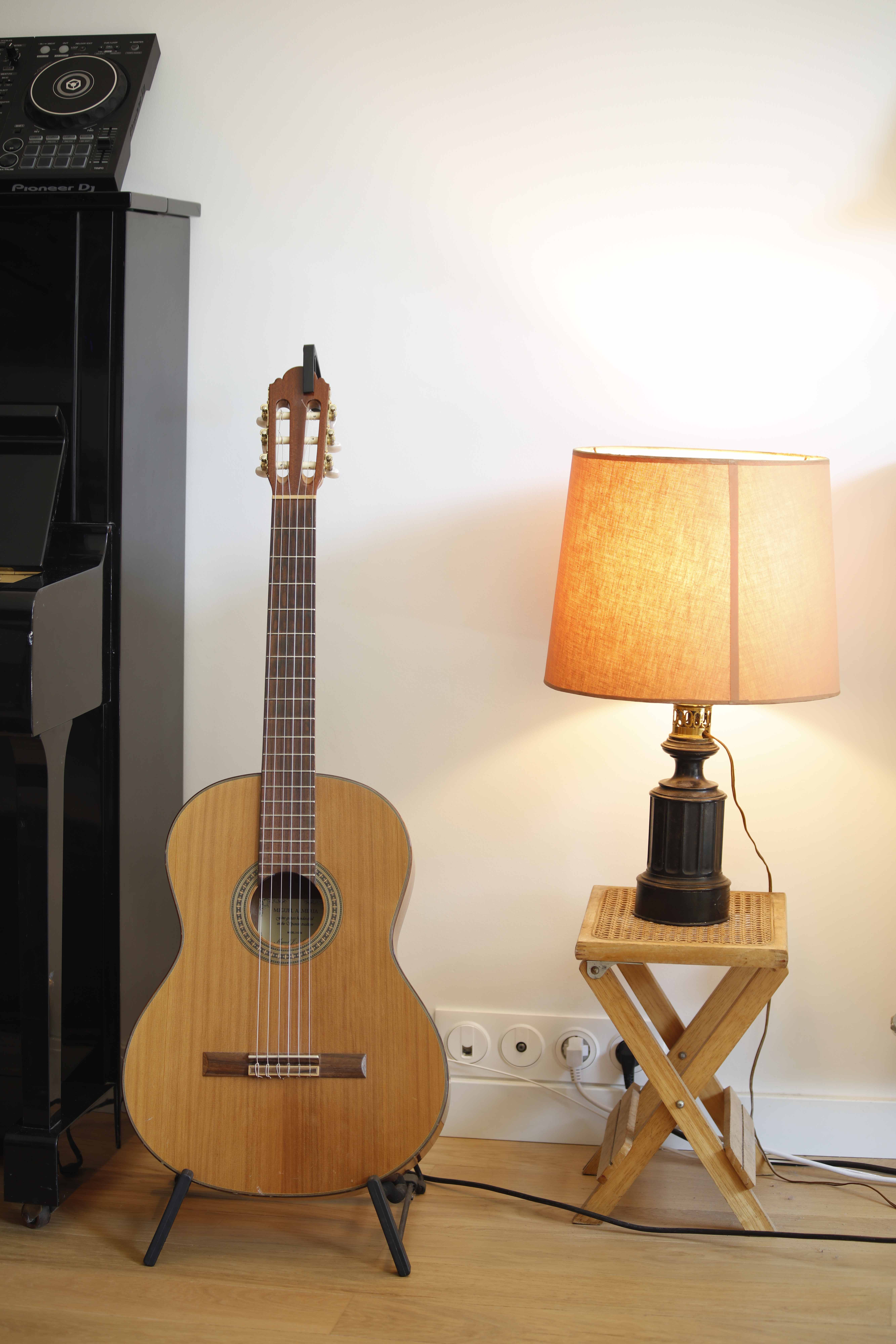 Classical guitar with vintage lamp